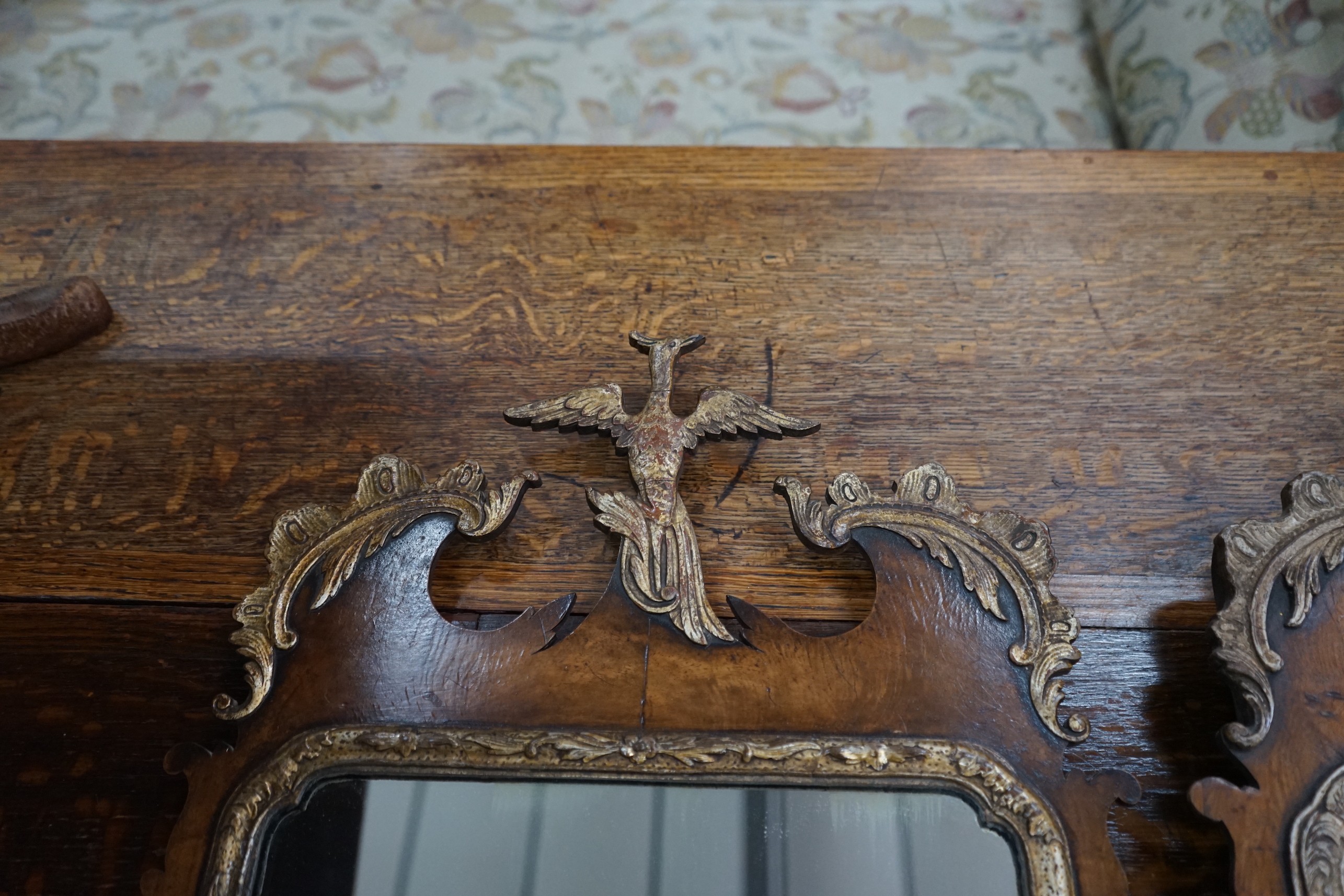 A pair of George III style yew fret cut wall mirrors, width 40cm, height 76cm